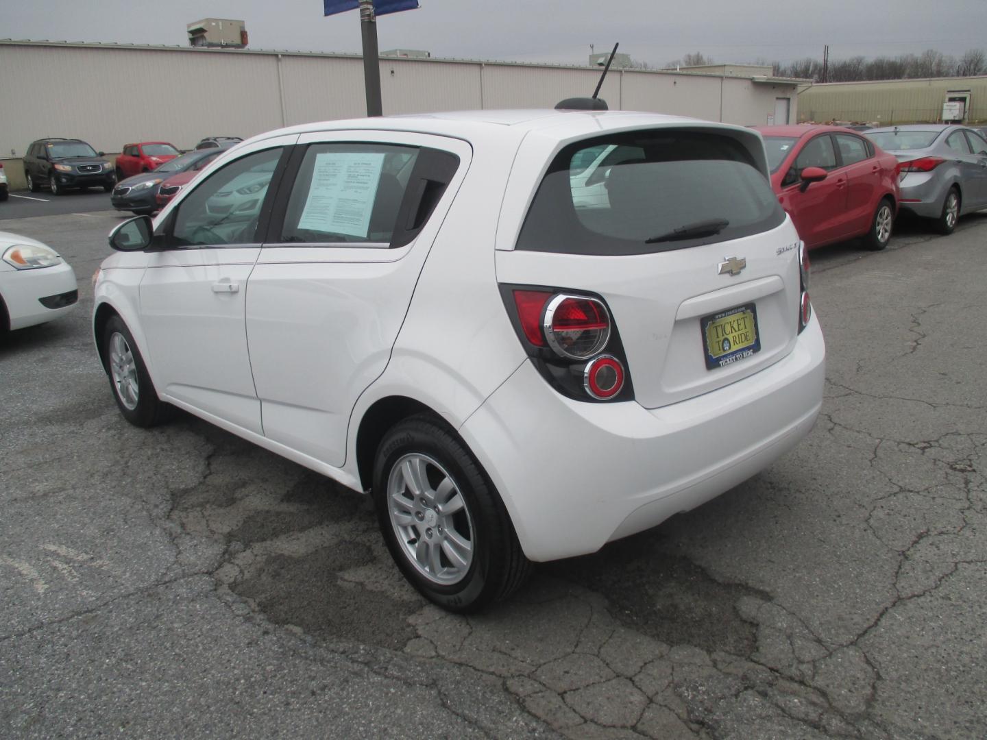 2015 WHITE Chevrolet Sonic LT Auto 5-Door (1G1JC6SH7F4) with an 1.8L L4 DOHC 24V engine, 6-Speed Automatic transmission, located at 1254 Manheim Pike, Lancaster, PA, 17601, (717) 393-9133, 40.062870, -76.323273 - Photo#5